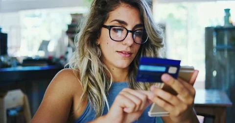 Woman Shopping on Smart Phone with Credit Card Stock Footage