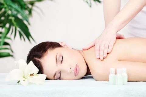 Woman on shoulder massage Stock Photos