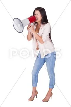 Woman shouting into a loud hailer Stock Photos