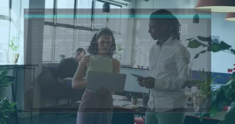 Woman showing laptop code, causing code overlay growing while man tapping device Stock Footage 329836106