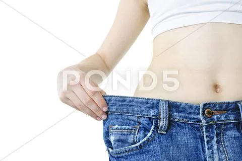 Woman showing weight loss Stock Photos