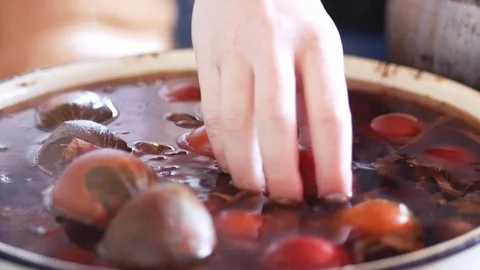 Woman Shows Easter Egg Colored In Traditional Way Stock Footage 106810347