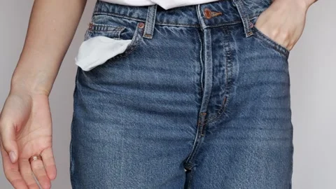 A woman shows her empty pockets. Stock Footage 306281245
