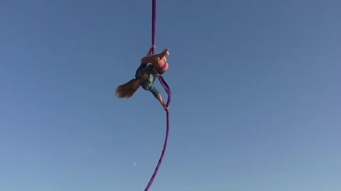 Woman shows tricks in the air. Stock Footage