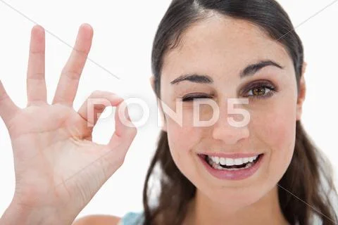 Woman signing that everything is fine Stock Photos