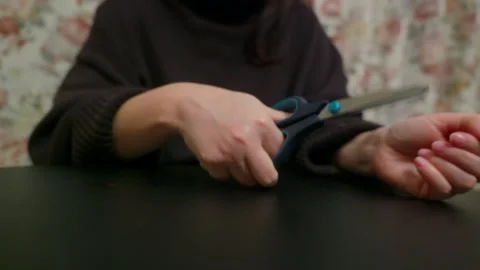 Woman Simulating Self Harm with Scissors Видео 332450249