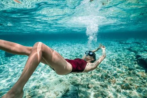 Woman Sinking Underwater Stock Photos