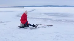 4K Ice Fishing - Camera is lowered throu, Stock Video