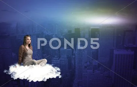Woman sitting on cloud above the city Stock Photos