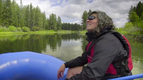 Woman sitting on raft Stock Footage 59665200