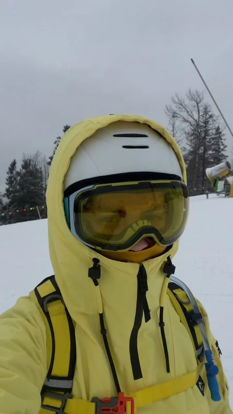 Woman skier taking selfie while skiing Stock Footage 254397635