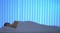 The woman sleeping in the bed. Evening night time 4k or 4k+ Resolution