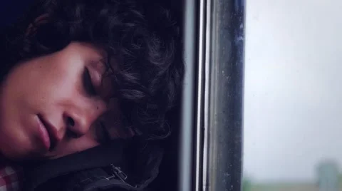 Woman sleeping in train Video stock 44727236