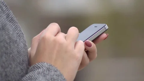 Woman with Smartphone Stock Footage