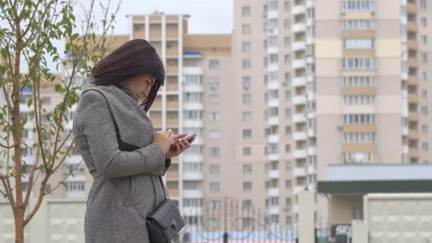 Woman with Smartphone Stock Footage
