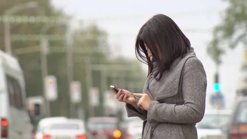 Woman with Smartphone Stock Footage