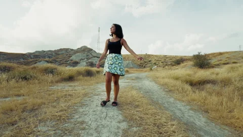Woman Smelling Flower While Walking In The Nature Stock Footage 283983964