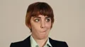 Woman smells something bad but tries to be discrete HD Footage