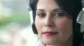woman smiles with headphones HD Footage