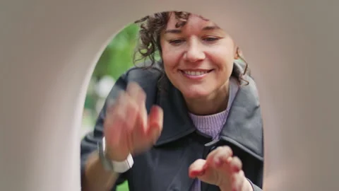 Woman Smiling when Receiving Package and Letters from Mailbox Stock Footage 316086777