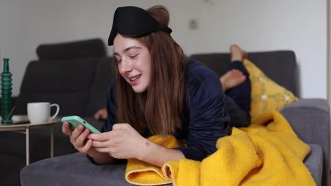 Woman smiling while scrolling social media Stock-Footage 341233899