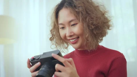 Woman Smiling While Using Camera Stock Footage 281094964