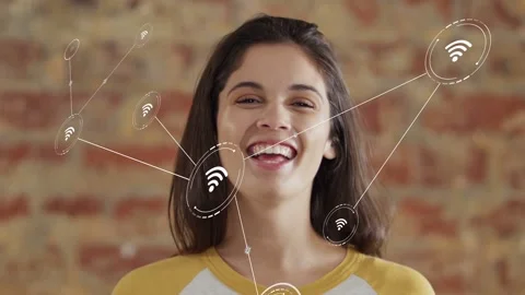 Woman smiling while Wi-Fi node appearing near cheek, growing tech network Stock Footage 333413837