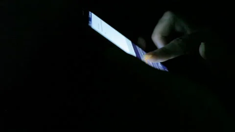 Woman sms texting using app on smartphone at night in city. Close-up. Video stock 101038124