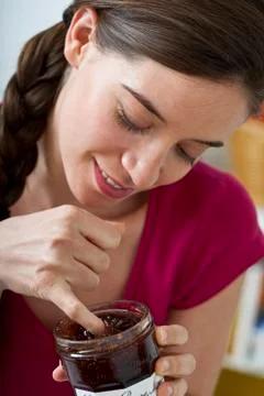 Woman snacking Stock Photos