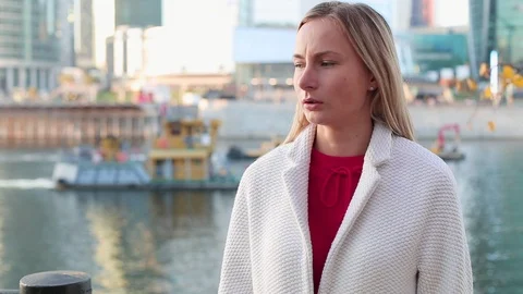 Woman sneezing at outdoor allergy Stock Footage 97468798