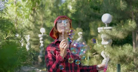 Woman with soap bubbles Stock Footage 138650154
