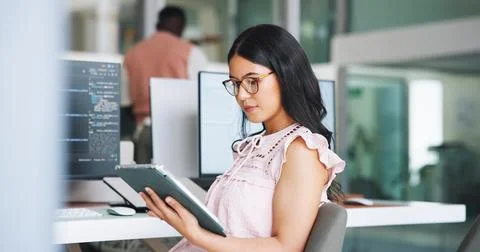 Woman, software developer and research in office with tablet, glasses or pl.. Foto stock