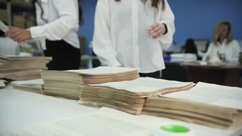 Woman sorting and organizing documents Stock Footage 301601824