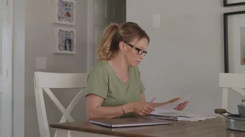 Woman Sorting Through Paperwork 스톡 동영상 208765922