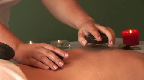 Woman at a spa health club getting a back massage Stock Footage