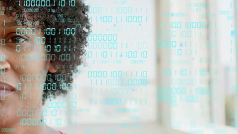 Woman speaking and smiling while teal binary scrolling over windows partly Stock Footage 333575472