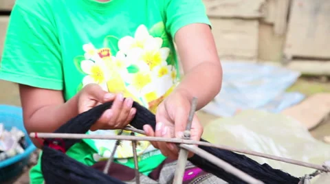 Woman spin yarn thread during warping process Stock Footage 62532903