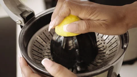 Woman Squeezing Lemon Slice Stock Footage 141602126