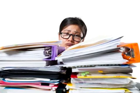 Woman with stack of binders and paperwork Stock Photos
