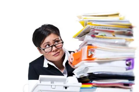 Woman with stack of binders and paperwork Stock Photos