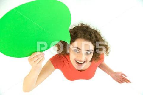 The woman stand with the green dialog sign. View from above Stock Photos