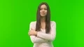 The woman stand on the green screen background 4k or 4k+ Resolution