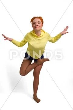 Woman stand on one leg in yoga pose isolated Stock Photos