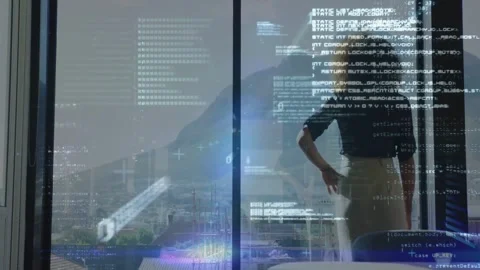 Woman standing at floor-to-ceiling window, shifting stance as code overlays Stock Footage 334185472