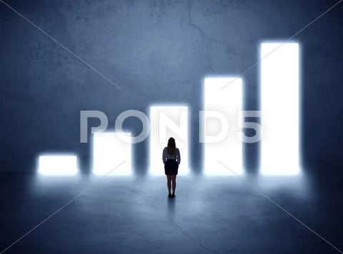 Woman standing in front of a chart Stock Photos