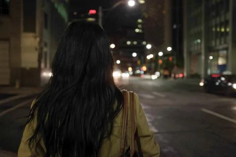 Woman standing at intersection Stock Photos