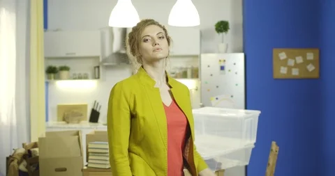 Woman standing at the kitchen. Stock Footage 116166259