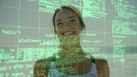 Woman standing on shore, code grid scrolling and fading, revealing smile turning Stock Footage 332902064
