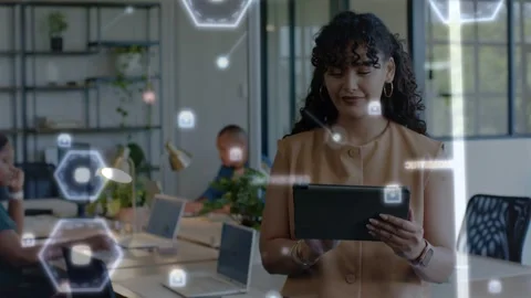 Woman standing with tablet, tapping, causing hexagon node overlay shifting as Video stock 333318341