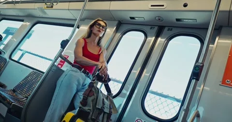 Woman Standing on Train Holding Backpack Urban Travel Stock Footage 323371717